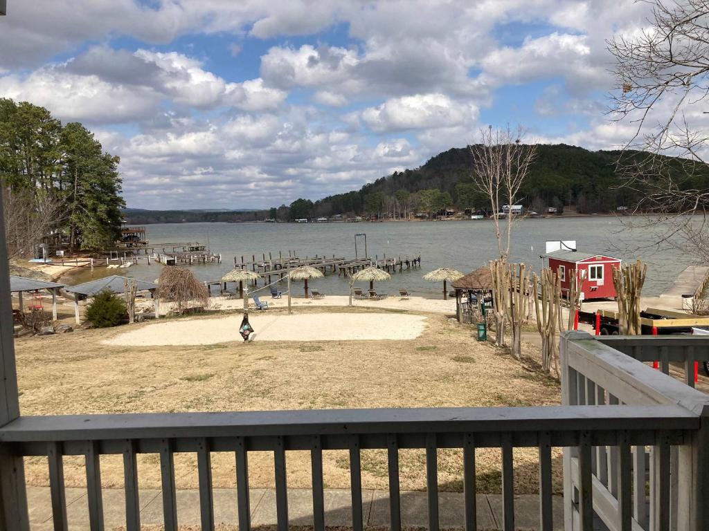 a person standing on a beach near a body of water at 51 The Anchor in Centre