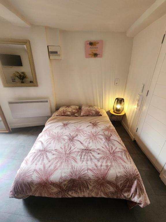 Posteľ alebo postele v izbe v ubytovaní Parfum mimosa
