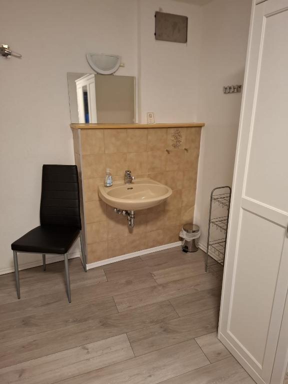 Koupelna v ubytování Hotel Garni Krone