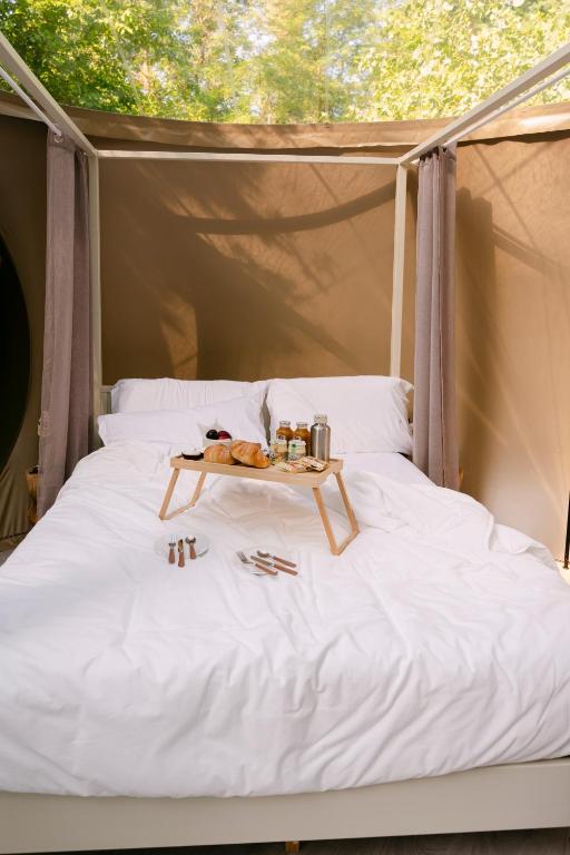 Postel nebo postele na pokoji v ubytování Glamping I Mulini