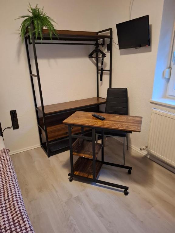 TV a/nebo společenská místnost v ubytování Hotel Garni Krone