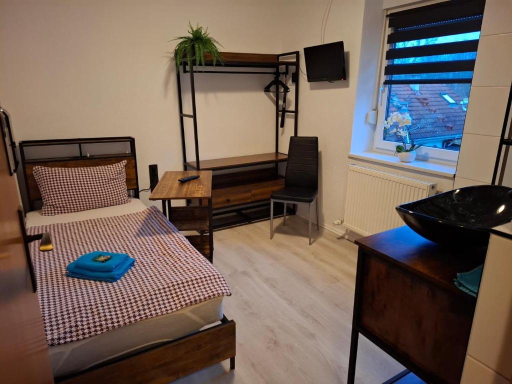 Postel nebo postele na pokoji v ubytování Hotel Garni Krone