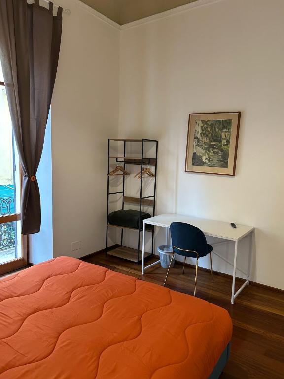 Postel nebo postele na pokoji v ubytování Cavour 142 Rooms