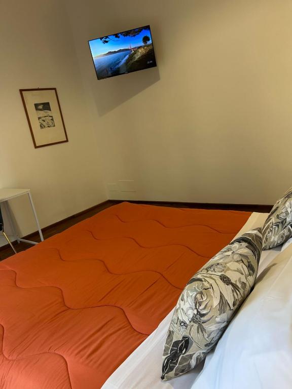 Postel nebo postele na pokoji v ubytování Cavour 142 Rooms