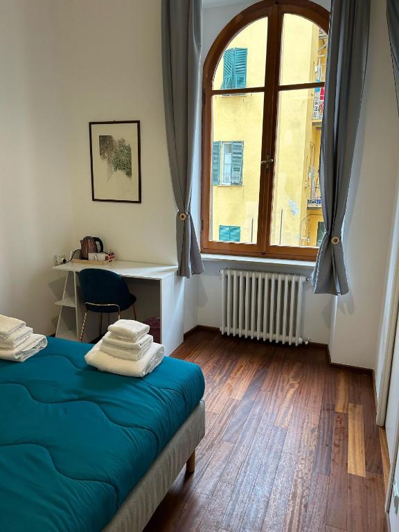 Postel nebo postele na pokoji v ubytování Cavour 142 Rooms