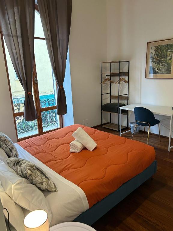 Postel nebo postele na pokoji v ubytování Cavour 142 Rooms