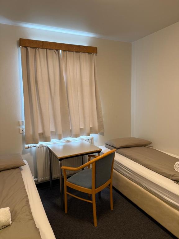Postel nebo postele na pokoji v ubytování Skogar Hostel