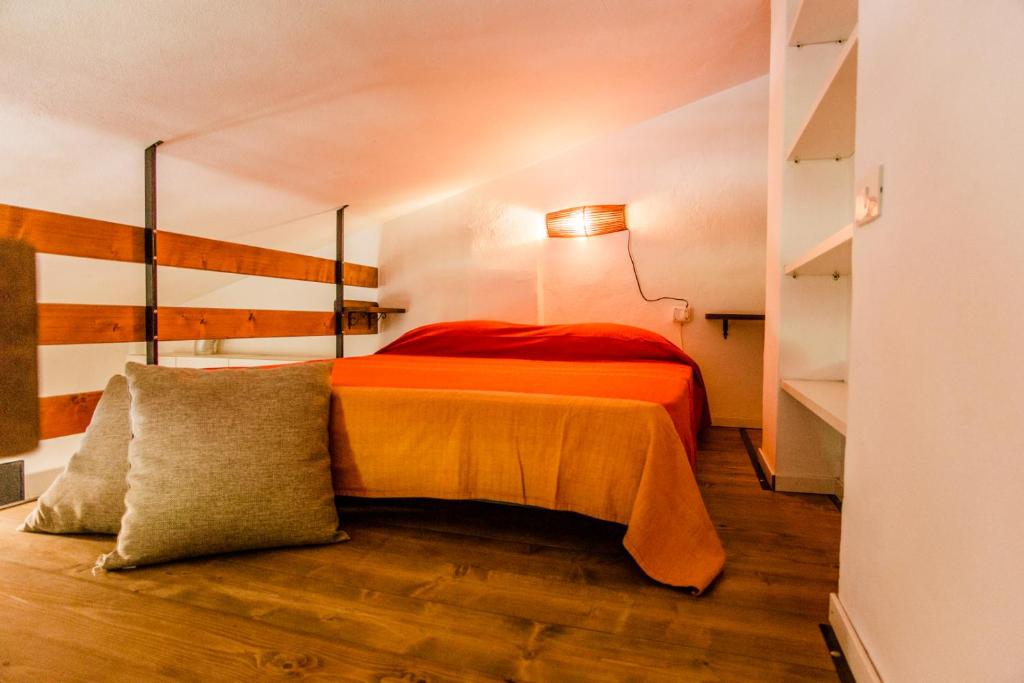 Łóżko lub łóżka w pokoju w obiekcie Agriturismo Serignano alle Rocchette
