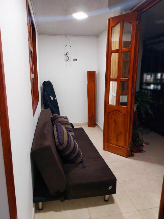 Posezení v ubytování La Casa de Doña Gilma en Pijao