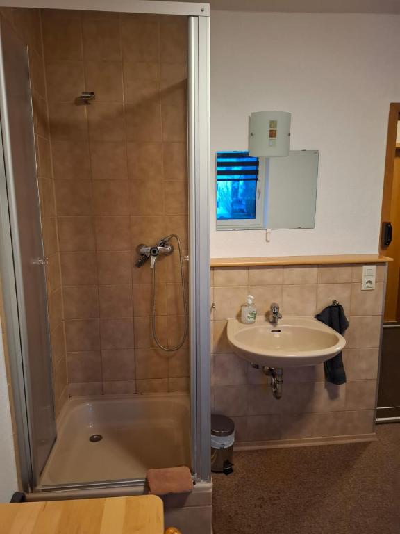 Koupelna v ubytování Hotel Garni Krone