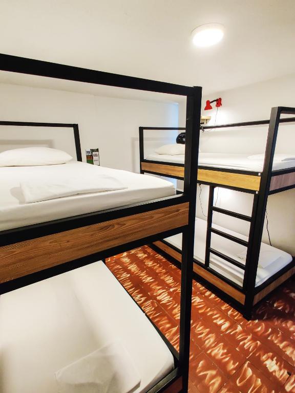 Katil atau katil-katil dalam bilik di Zamia Hostel
