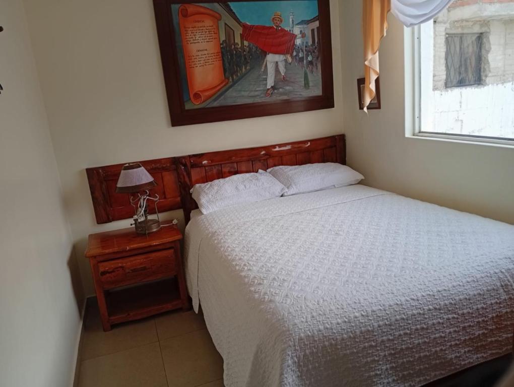 Postel nebo postele na pokoji v ubytování Hotel Maderanegra By Huasicama