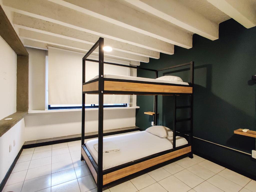 Katil atau katil-katil dalam bilik di Zamia Hostel