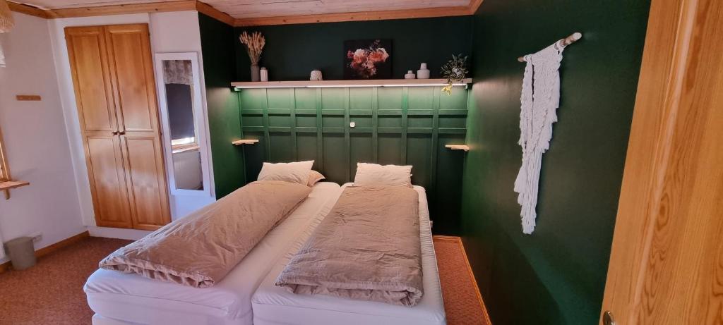 Postel nebo postele na pokoji v ubytování Wild Power Guesthouse