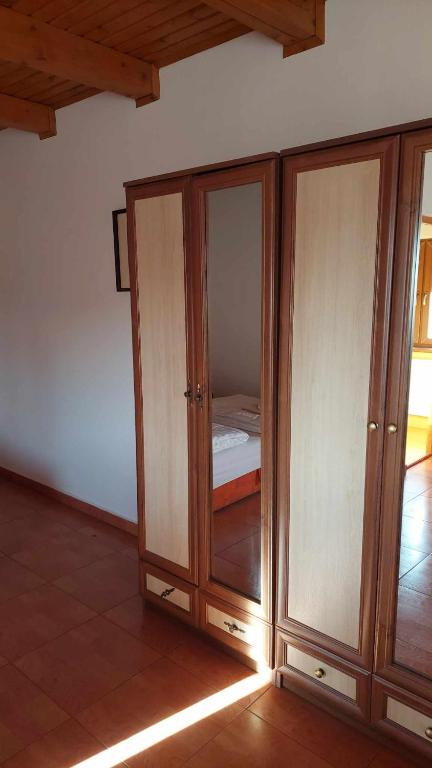 Posteľ alebo postele v izbe v ubytovaní Mediterrán Apartman és Vendégház
