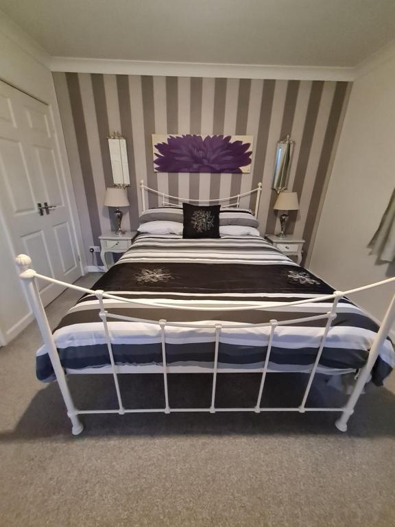 Postel nebo postele na pokoji v ubytování Richlands Homestay