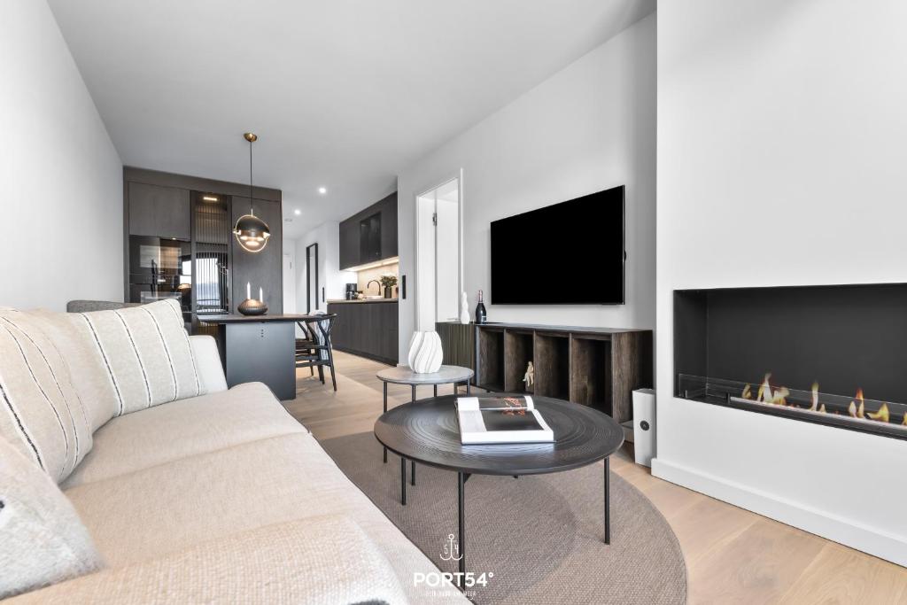 TV a/nebo společenská místnost v ubytování Central Park Suite List auf Sylt