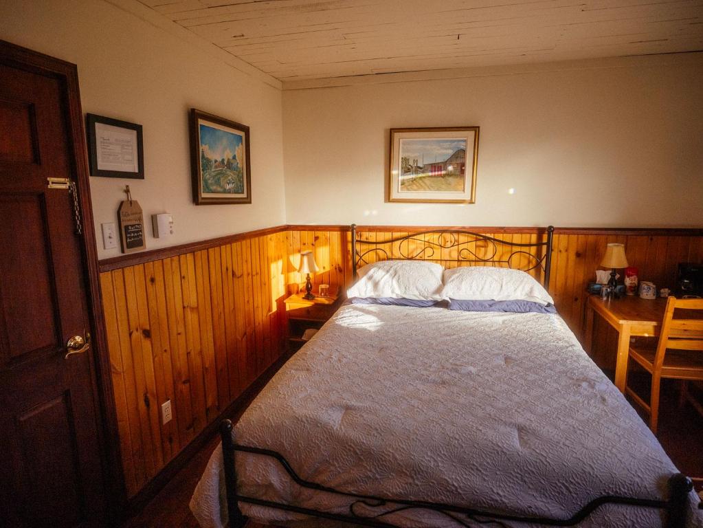 Voodi või voodid majutusasutuse Inukshuk, chambre 3 toas