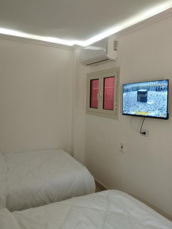 Pyramids House inn客房内的一张或多张床位