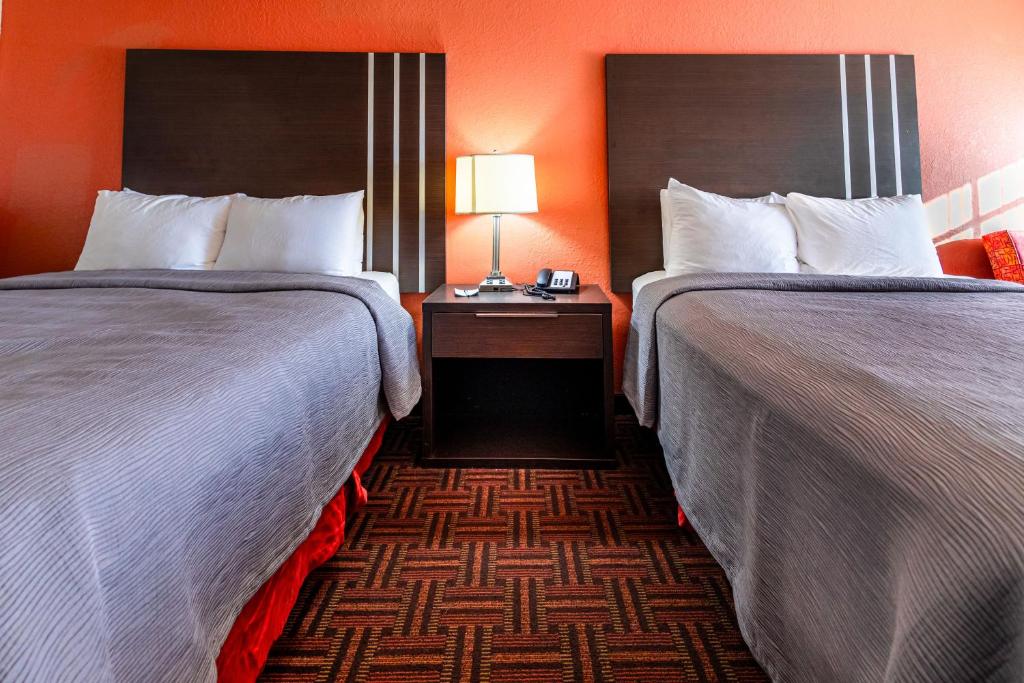 Postel nebo postele na pokoji v ubytování Quality Inn Amarillo I-40 East