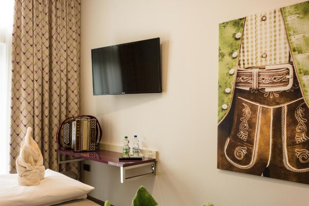 TV a/nebo společenská místnost v ubytování Wuschl Lounge