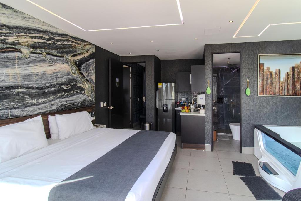 Postel nebo postele na pokoji v ubytování Haven A Design Hotel
