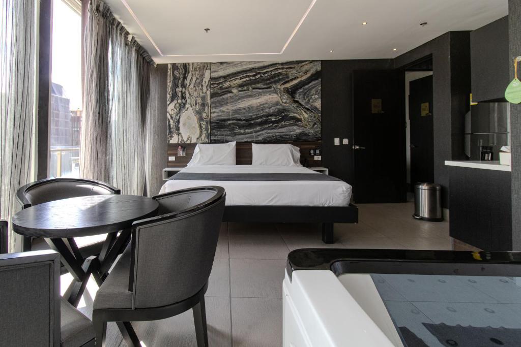 Postel nebo postele na pokoji v ubytování Haven A Design Hotel