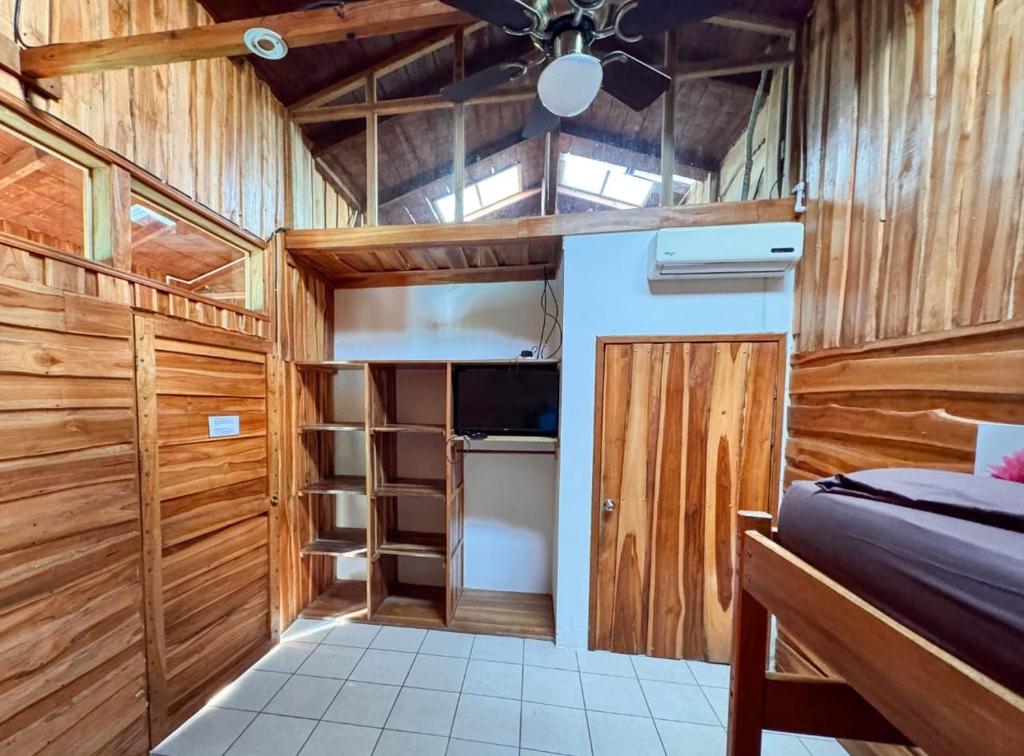 Postel nebo postele na pokoji v ubytování Hotel Delfines Puerto Jimenez