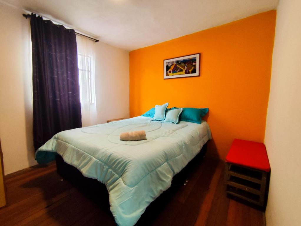 Postel nebo postele na pokoji v ubytování Mico Loco Casa Hostal