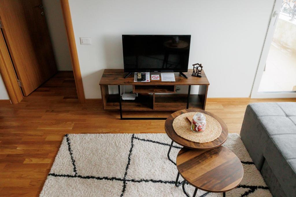TV a/nebo společenská místnost v ubytování Duma Apartment