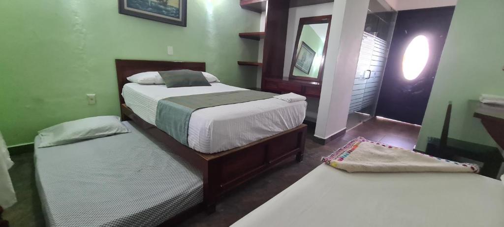 Postelja oz. postelje v sobi nastanitve Hotel Rosa de los vientos