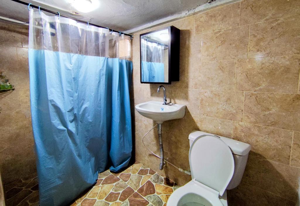 Koupelna v ubytování Mico Loco Casa Hostal