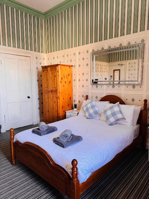 Postel nebo postele na pokoji v ubytování Edinburgh Travel Guest House