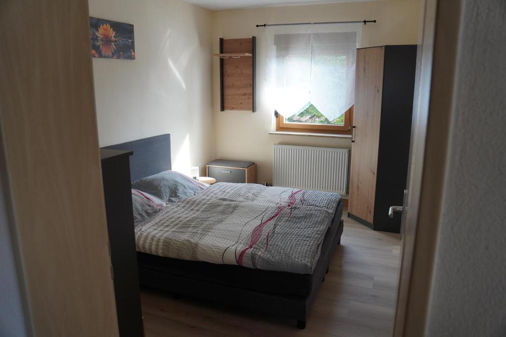 Postel nebo postele na pokoji v ubytování Ferienwohnung Sebald