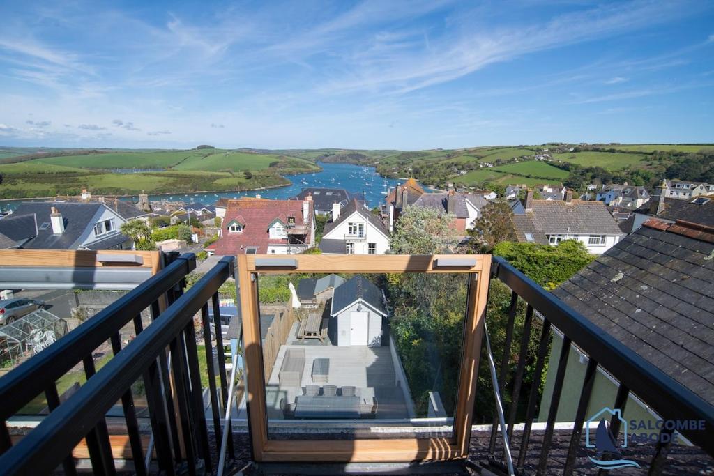 a view from the balcony of a house at Stylish Sanctuary - Estuary Views - Outside Space in Salcombe