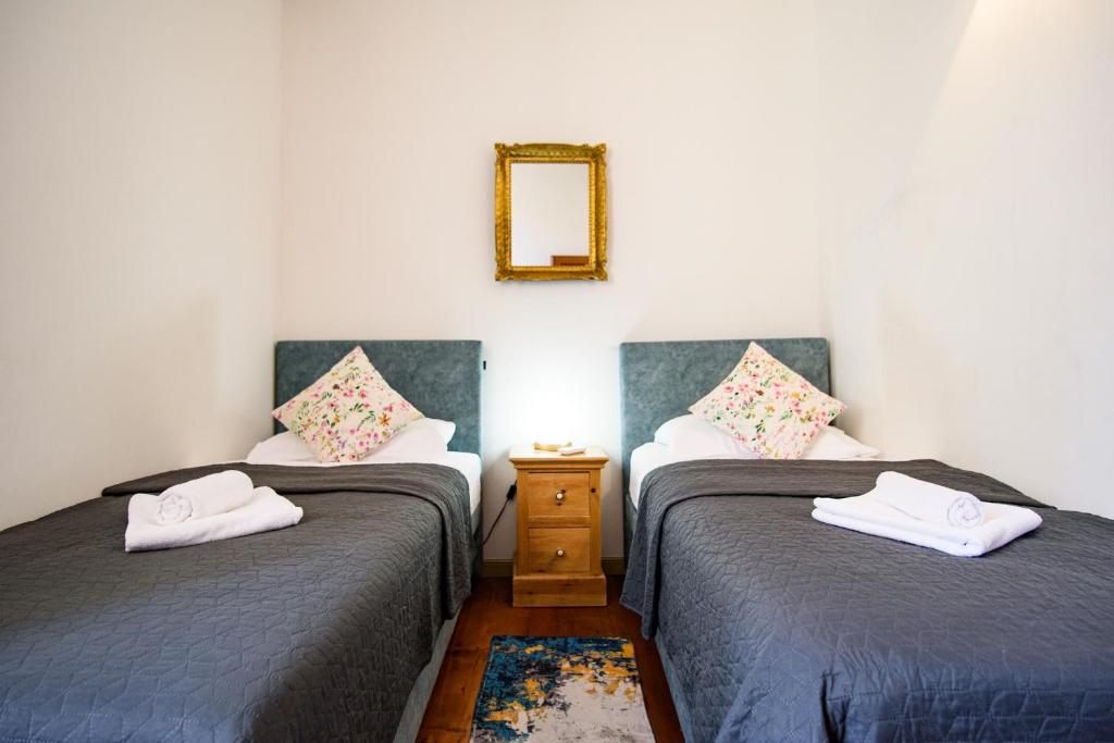 Posteľ alebo postele v izbe v ubytovaní SARACA PALACE by DuHomes