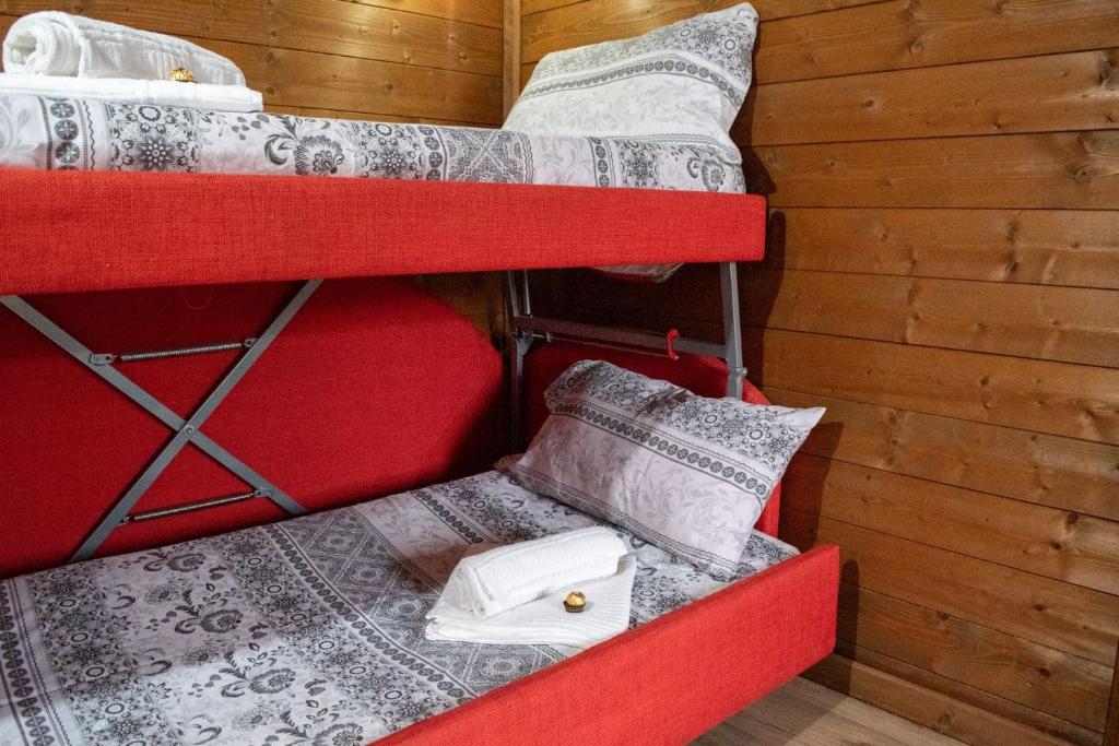 Postel nebo postele na pokoji v ubytování B&B La Genzianella