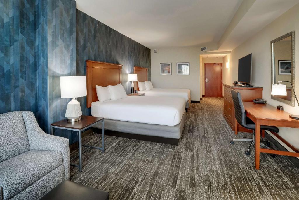 Postel nebo postele na pokoji v ubytování Drury Plaza Hotel Mt Vernon