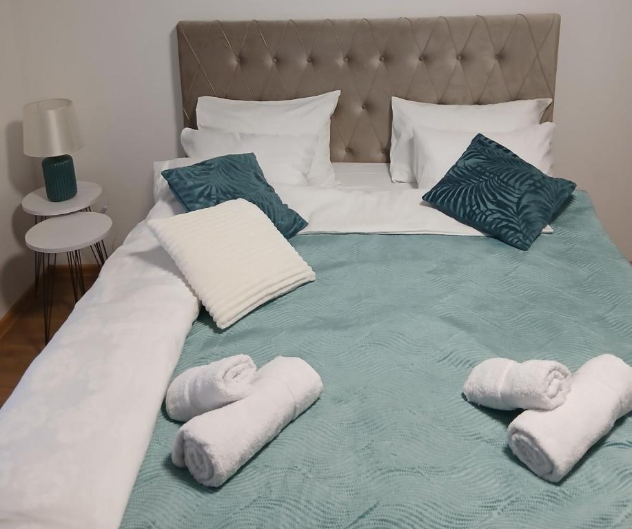 Postel nebo postele na pokoji v ubytování Apartman Lučiano Aranđelovac