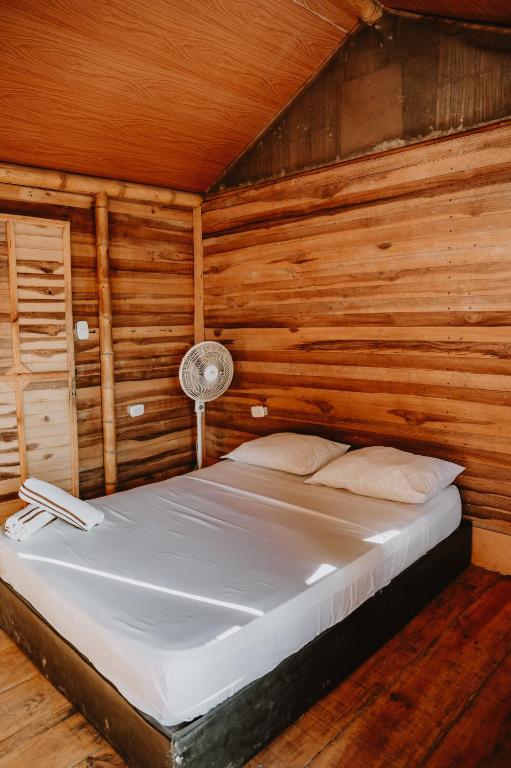 Postel nebo postele na pokoji v ubytování Hostal Casa Celeste