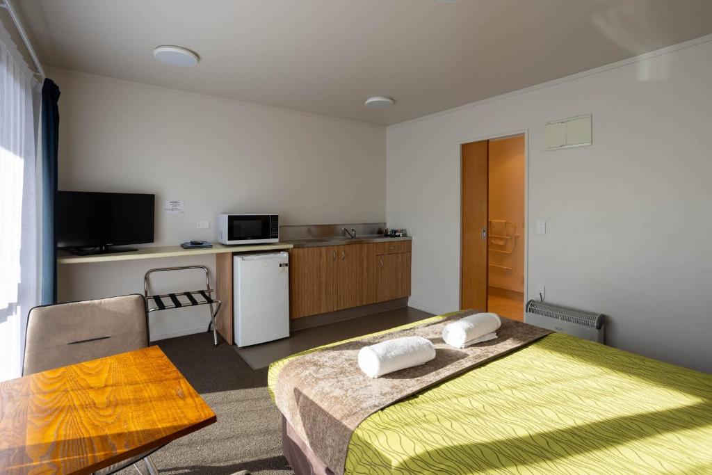 Kuchyň nebo kuchyňský kout v ubytování Alpine Glacier Motel