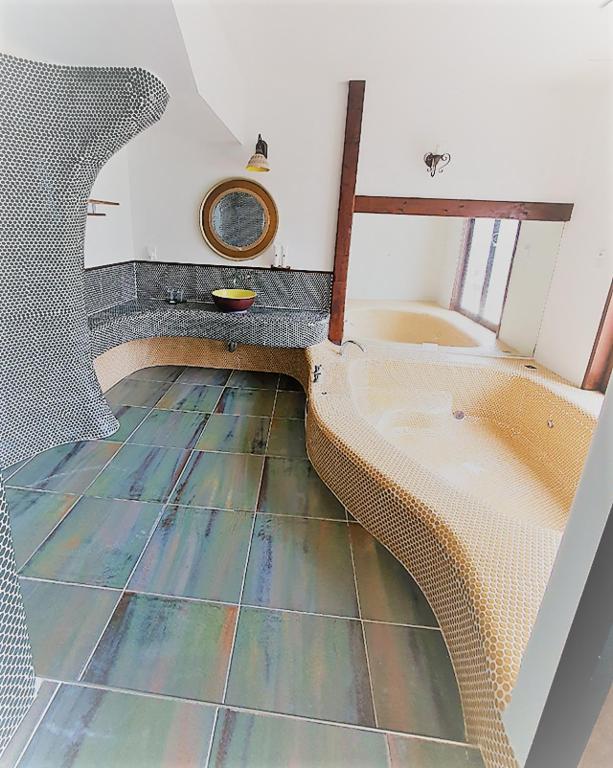 Postel nebo postele na pokoji v ubytování Olle Resort