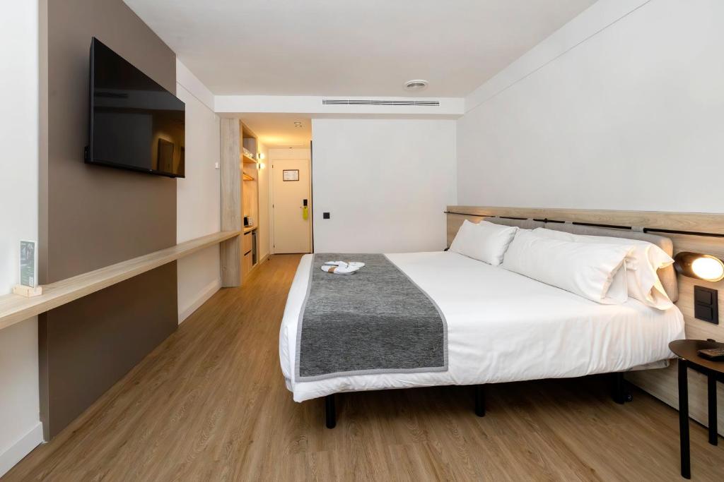 Sercotel Delfos Andorraにあるベッド