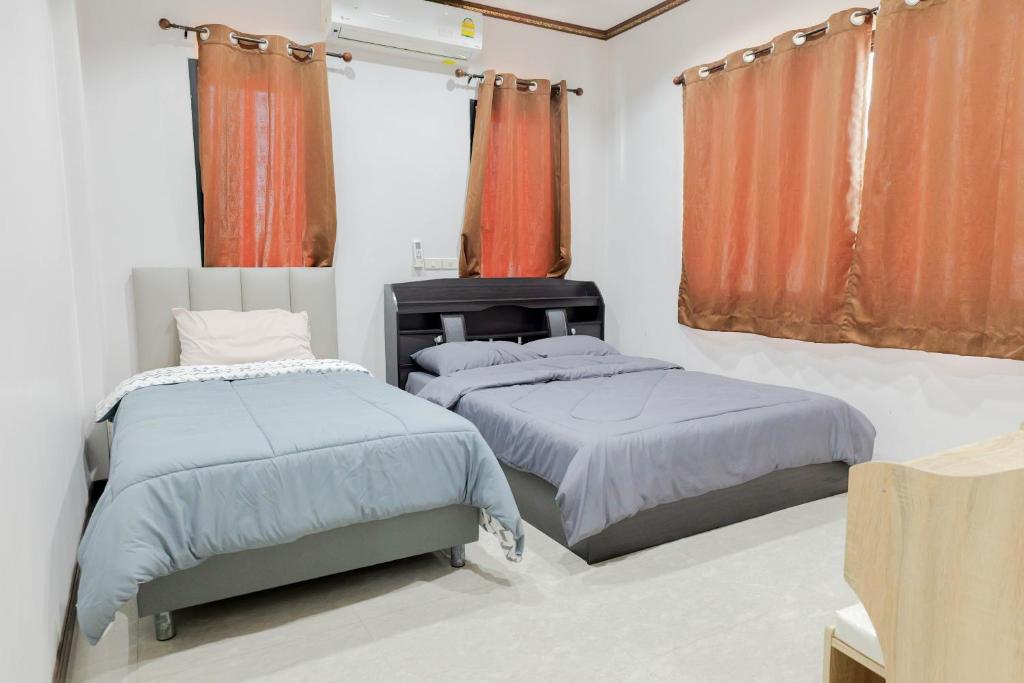 Katil atau katil-katil dalam bilik di LV Villa Cha-am