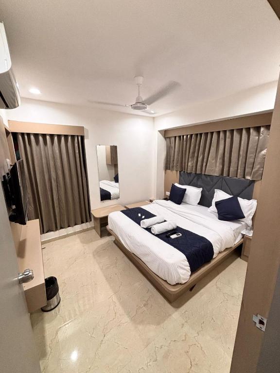 Postel nebo postele na pokoji v ubytování Hotel Royal Square