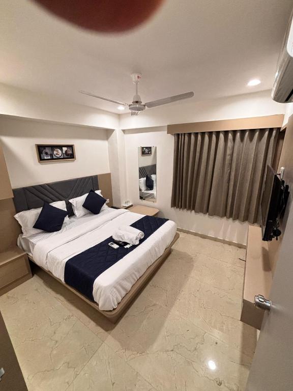 Postel nebo postele na pokoji v ubytování Hotel Royal Square