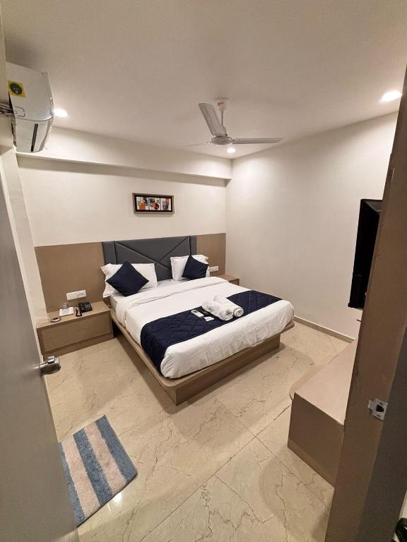 Postel nebo postele na pokoji v ubytování Hotel Royal Square