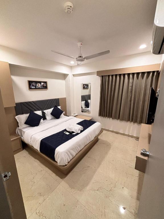 Postel nebo postele na pokoji v ubytování Hotel Royal Square