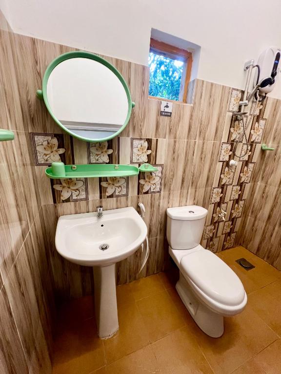 Koupelna v ubytování TEMBO Cottage Wilpattu
