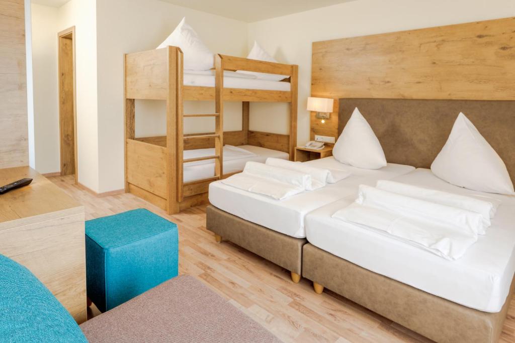Postel nebo postele na pokoji v ubytování Hotel Mythos